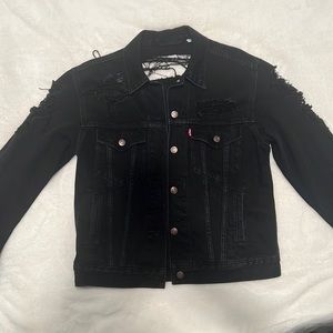 Black distressed Levi’s jacket